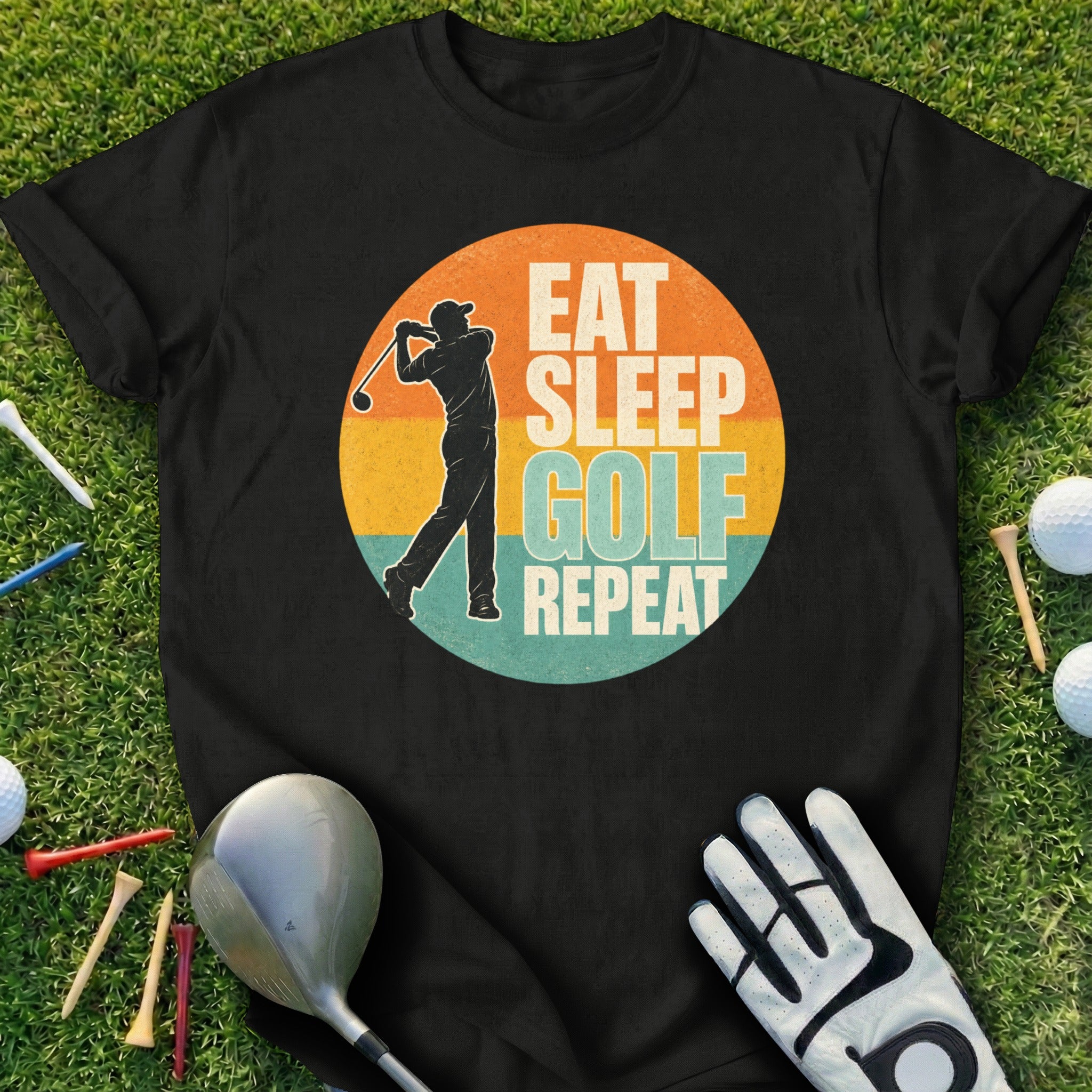 Black t-shirt with "Eat Sleep Golf Repeat" graphic and golfer silhouette.