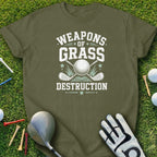 Green t-shirt with "Weapons of Grass Destruction" text, golf ball, and clubs.