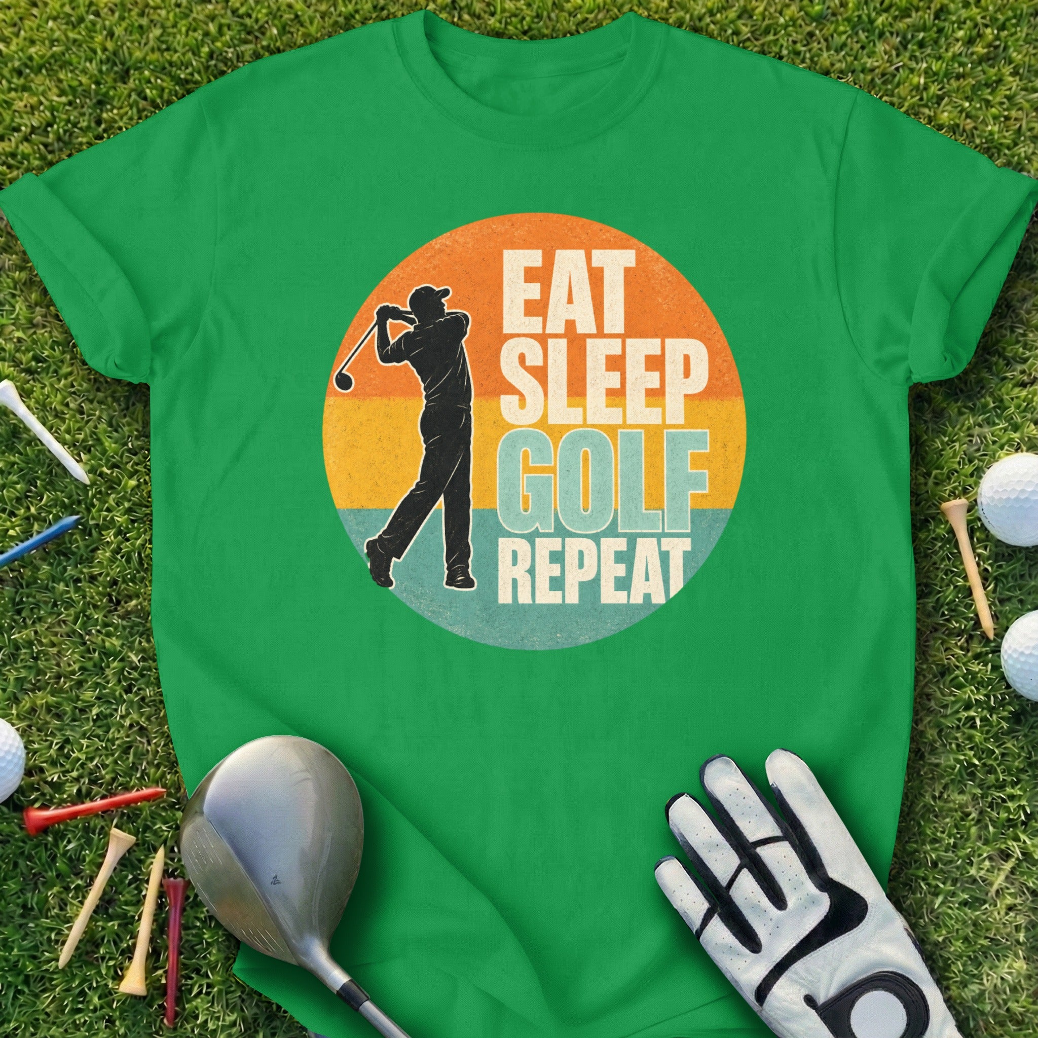 Green t-shirt with "Eat Sleep Golf Repeat" text and golfer graphic.