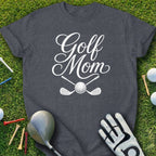 Dark grey t-shirt with "Golf Mom" text and crossed golf clubs and ball.
