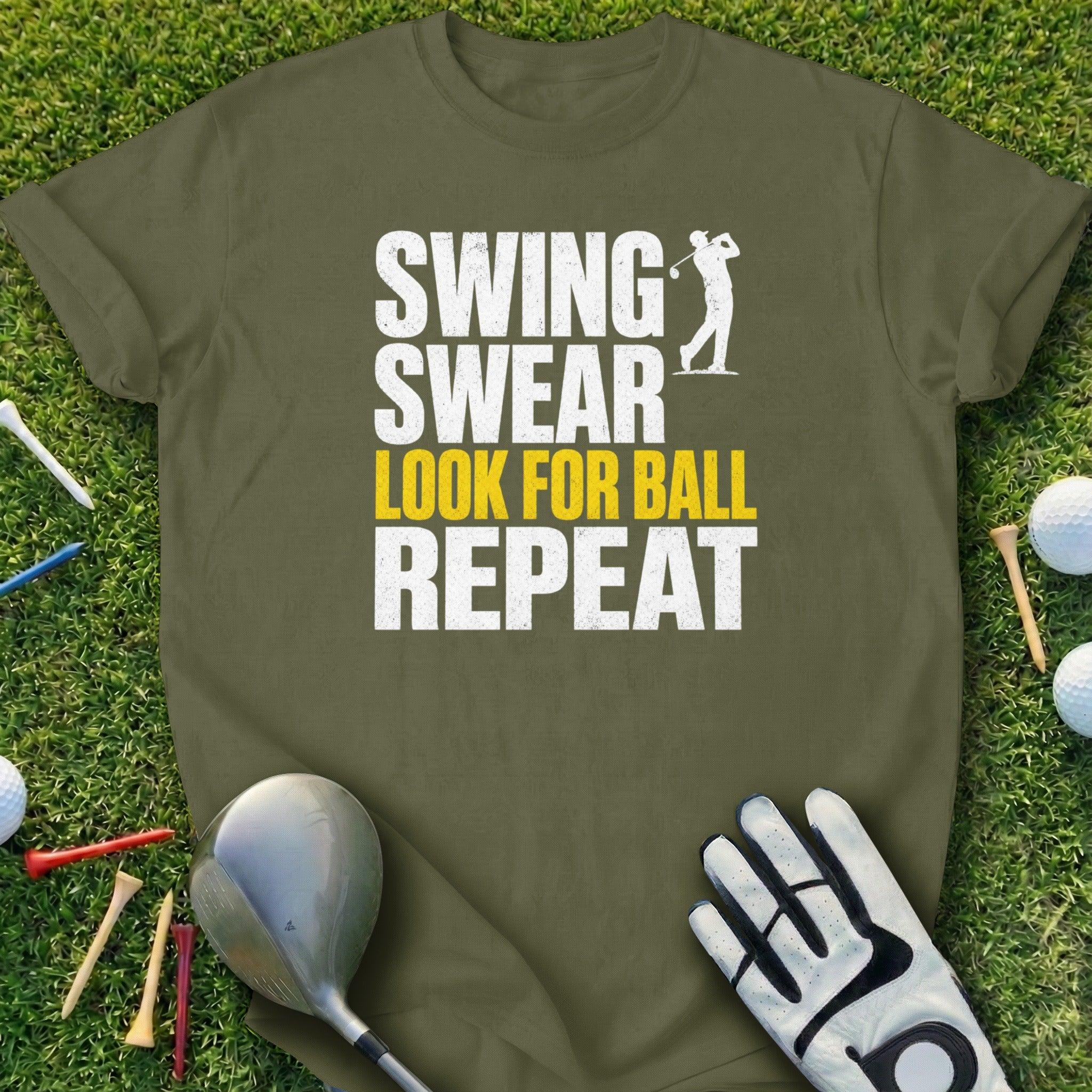 Olive t-shirt with "Swing, Swear, Look For Ball, Repeat" graphic.