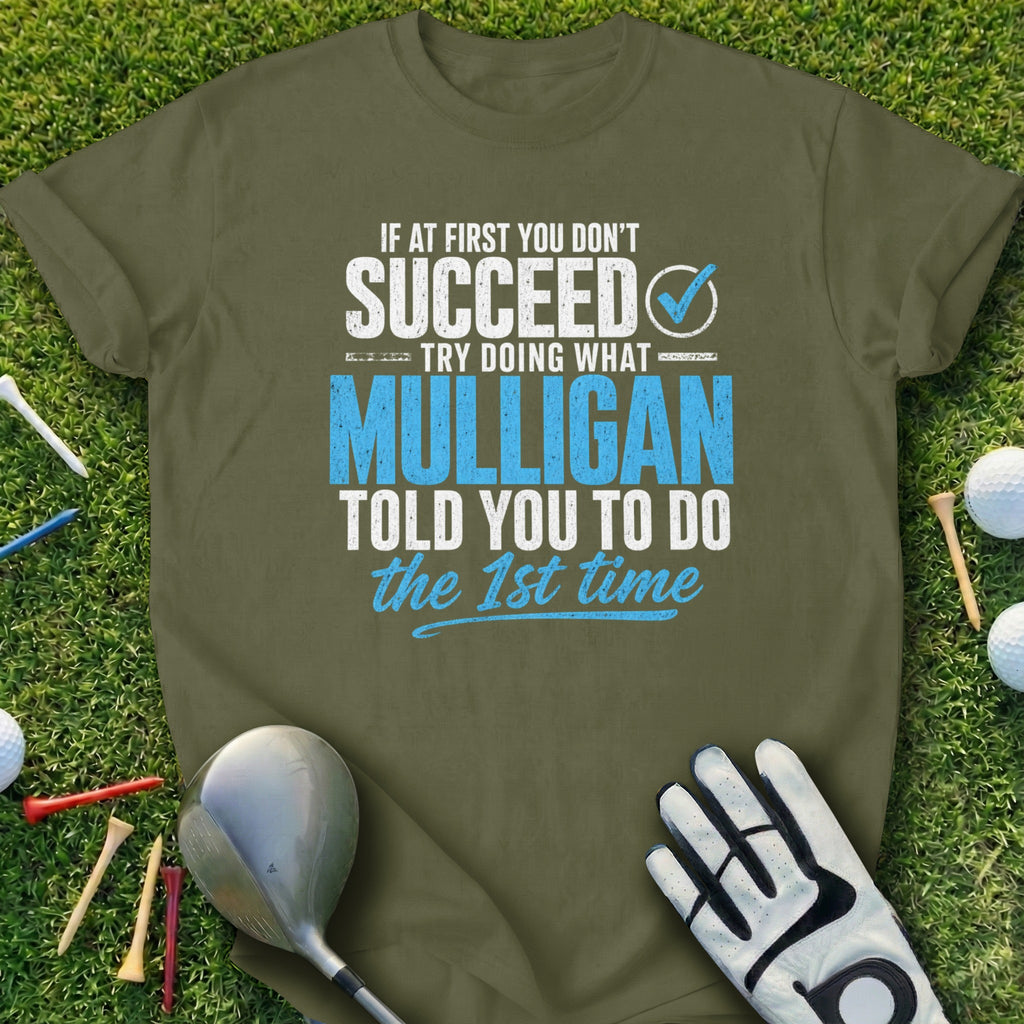 Green t-shirt with text about succeeding and mulligans in golf.