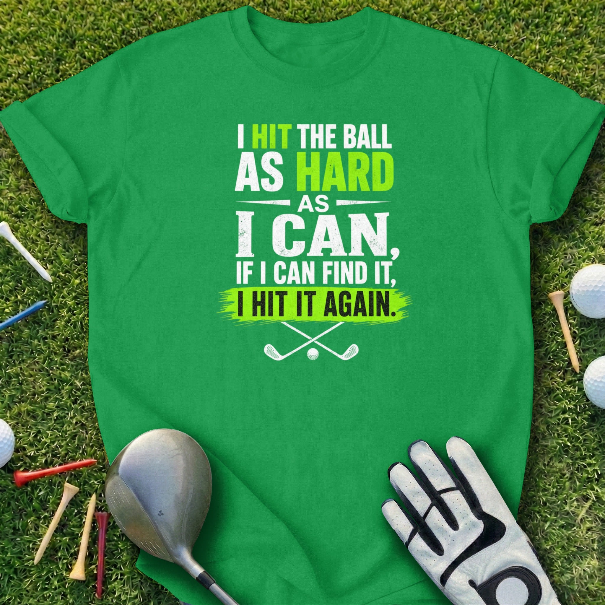Green t-shirt with "I hit the ball as hard as I can, if I can find it, I hit it again."