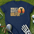 Navy t-shirt with "World's Okayest Golfer" text and golfer silhouette.