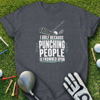 Dark t-shirt with "I golf because punching people is frowned upon" text and golf accessories.